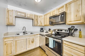 Kitchen | 2-Story Apartment | Keyless Entry | Convenient Location
