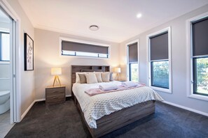 Master Bedroom with Queen Bed + Ensuite