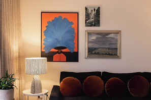Relax in the open plan, beautifully curated lounge room, perfect for unwinding in style.