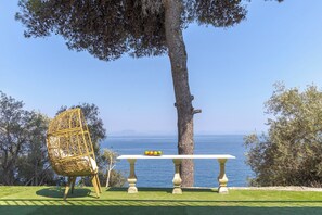 Enjoy a quiet moment on the patio with a full sea view