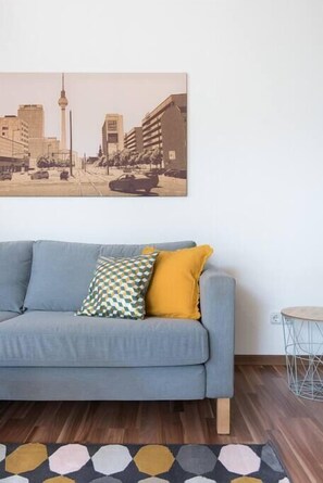 A really cosy couch with some throw pillows.