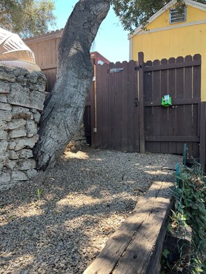 Pathway at the top of the stairs to the right.. gate #2 entering the property
