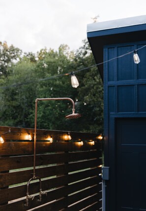 Be refreshed in the outdoor shower, available in spring and summer.
