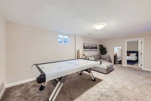 Air hockey table in the game room