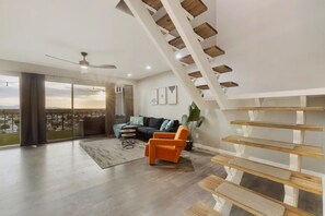 Living room with Staircase