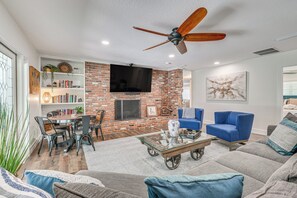 Front Room | Decorative Fireplace | Books | Board Games