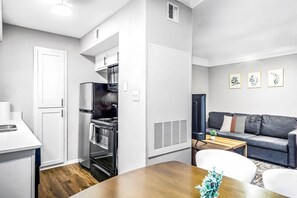 The dining area invites you to savor every moment, whether enjoying a quiet meal or hosting a festive gathering.