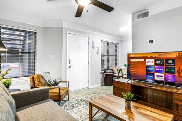 Once you enter the living room you'll find a space that feels both luxurious and cozy, perfect for unwinding after a long day.