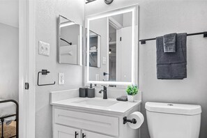 The bathroom is a private sanctuary, with a layout and features that make it the perfect place to rejuvenate.