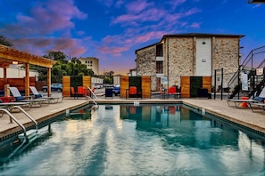 Sparkling private pool with lounge chairs and plenty of space to soak up the sun, ideal for lazy afternoons and refreshing dips.