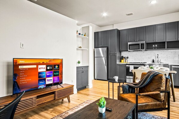 Once you enter the living room you'll find a space that feels both luxurious and cozy, perfect for unwinding after a long day.