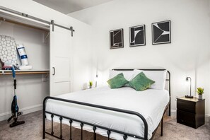 As you enter the bedroom, the comfortable bedding and peaceful atmosphere create the perfect retreat from the day.