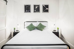 As you enter the bedroom, the sophisticated decor and plush bedding create a space where you can truly unwind.
