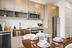 As you take your seat, the dining room's sophisticated design sets the stage for memorable meals and conversations.