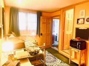 Enjoy the cozy entrance area, bedroom, bathroom suite with a double headed deluxe shower.