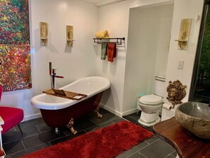 Please, enjoy this oasis for long baths and rejuvenating  spa-like shower with massage nozzles.