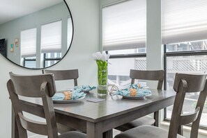 Enjoy meals at the cozy kitchen table that seats 4.