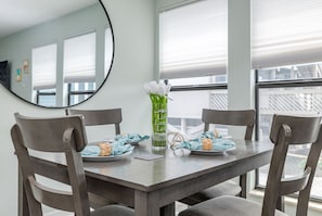 Enjoy meals at the cozy kitchen table that seats 4.