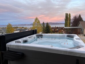 Soak in the hot tub while soaking in the stunning views of Bear Lake