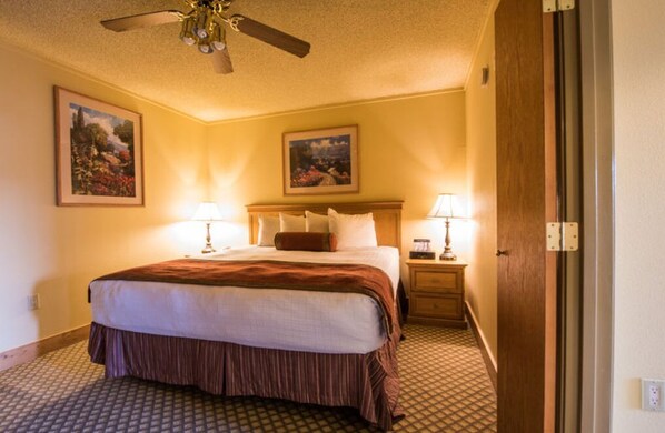 Inviting bedroom with a queen bed and warm decor
