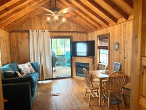 View of living room with 40 inch tv, Disney, Netflix, and Roku channels