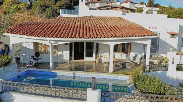 Drone, front bulding and pool.