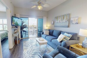 Comfortable Living Room: With full canal views and a queen sleep sofa for additional guests.