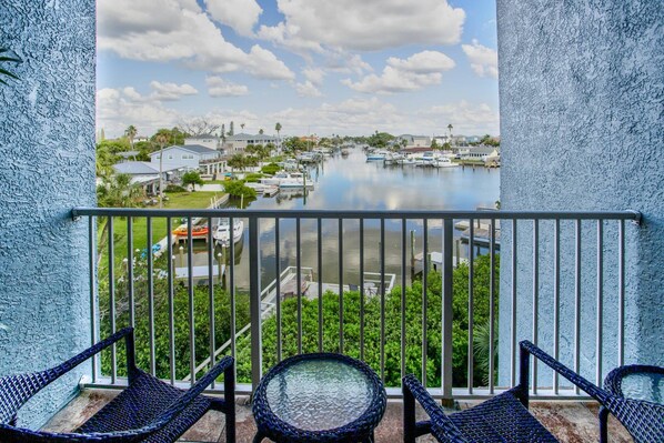 Relax on the private balcony with a great view of the bay.