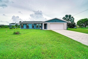 Property Exterior | Canal Views | Screened-In Lanai