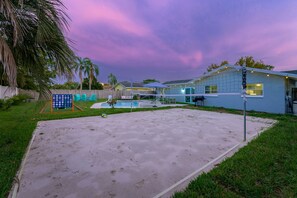 Serve up some fun on the sand volleyball court!