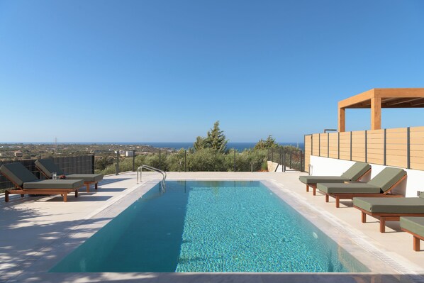 Welcome to Olvios Villa III, a luxurious escape with stunning sea views.