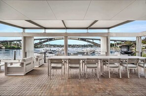 Enjoy stunning 180-degree waterfront views and unwind on our expansive balcony—ideal for alfresco dining and making unforgettable memories