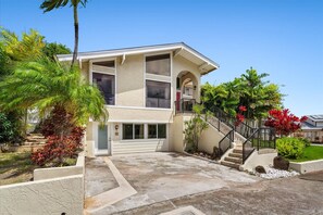 Cottage attached to beautiful home in Hawaii Kai. Entrance to cottage is the stairs to the left of the driveway