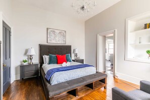Cozy Bedroom With A Queen Bed, Modern Touches, And A Comfortable Setup