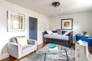 Inviting Corner With Elegant Seating And Modern Accents