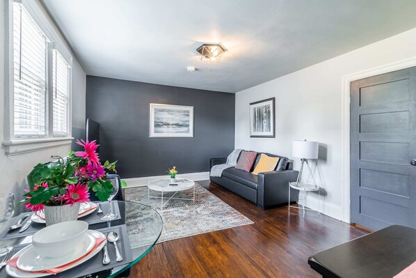 Modern Living Room With Stylish Black Accent Wall