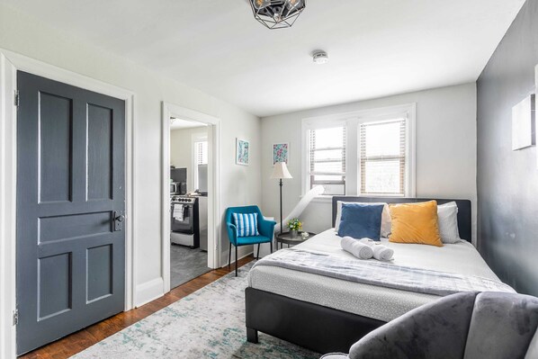 Bright Bedroom With Stylish Decor And Ample Natural Light