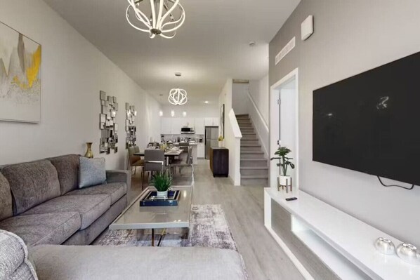 Kick back and relax in the spacious living room, perfect for movie nights or just lounging after a day of adventure.