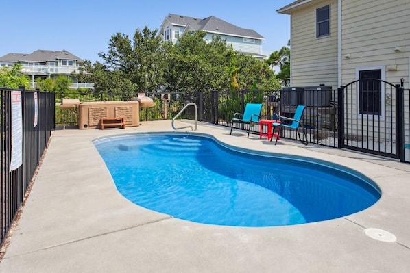 Enjoy the Private Pool (26' x 12') and bubbly Hot Tub, perfect for cooling off or unwinding.