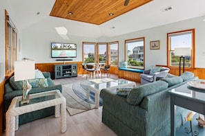 Relax in the spacious Living Area that opens directly onto a Sun Deck with stunning ocean views.