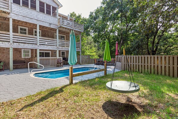 The Outdoor Entertainment Area with a Private Pool is the perfect place to spend an afternoon in the sun!