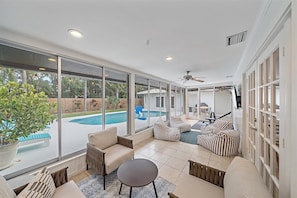 Climate controlled sunroom so you can beat the heat but still enjoy the Sarasota sun!