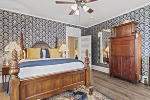 Bedroom Retreat: Elegant wooden furnishings and stunning decor create a unique relaxation haven!