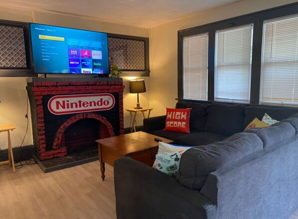 As you take a seat in the living room, the comfortable furniture and tasteful design make it easy to unwind.