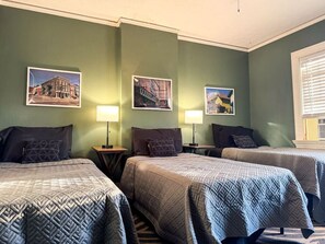 As you settle into the twin beds, you’re surrounded by a calming ambiance that promises a peaceful night’s sleep.