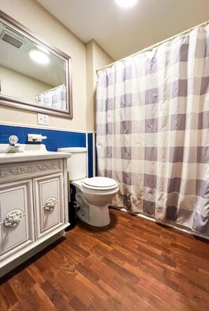 You feel a sense of calm as you enter the bathroom, where the thoughtful design and high-quality materials create a serene environment.