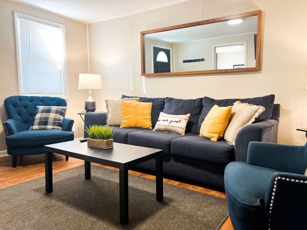 Relax in the living room and watch your favorite shows, lounging is a great way to unwind after a long day.