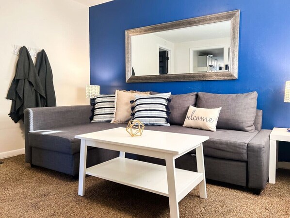 As you take a seat in the living room, the comfortable furniture and tasteful design make it easy to unwind.