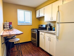 As you step into the kitchen, the clean lines and functional design make you eager to start cooking your favorite dishes.