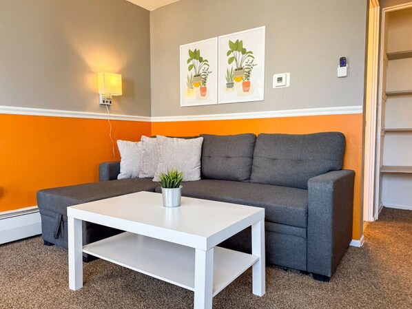 As you take a seat in the living room, the comfortable furniture and tasteful design make it easy to unwind.